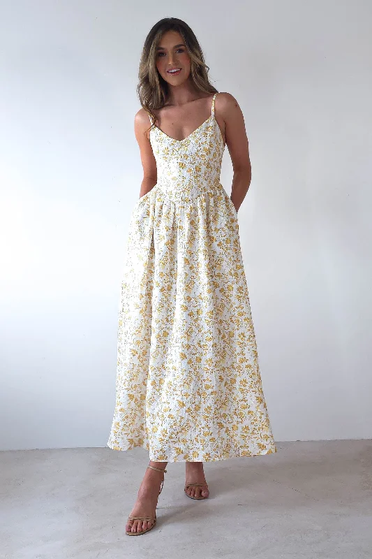 Midi dresses with pleated bodices for a classic and tailored look Carolyn Floral Print Maxi Dress | Yellow Print