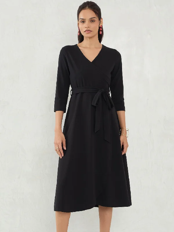 Midi dresses with wrap - around skirts for a customizable fit Black Knit Wrap Midi Dress Midi dresses with wrap - around skirts for a customizable fit Black Knit Wrap Midi Dress