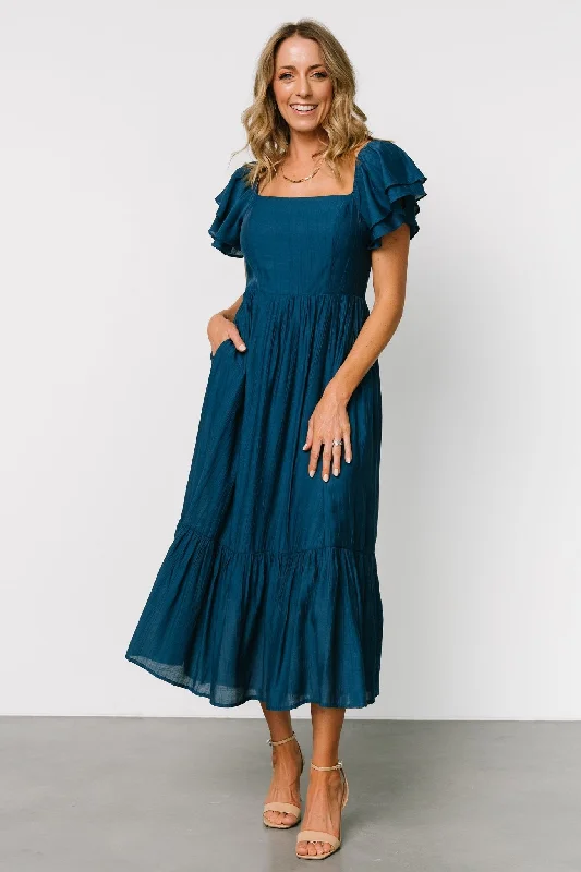 Midi dresses with ruched sleeves for a more fitted and stylish arm look Buttercup Midi Dress | Deep Blue