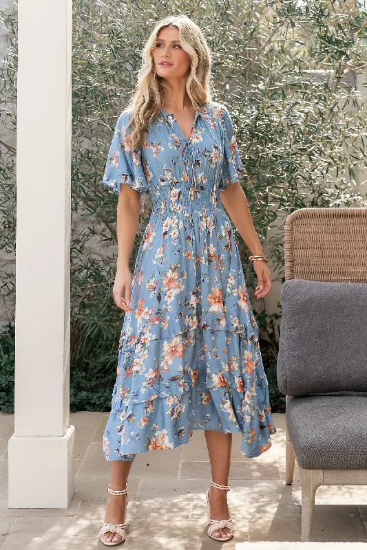 Midi dresses with ruched bodices for a feminine and fitted feel Spell Boho Midi Dress | Blue + Peach Floral Midi dresses with ruched bodices for a feminine and fitted feel Spell Boho Midi Dress | Blue + Peach Floral