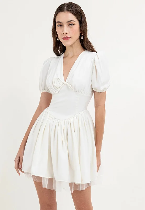 Mini dresses with embroidered details for a unique touch Sabrina