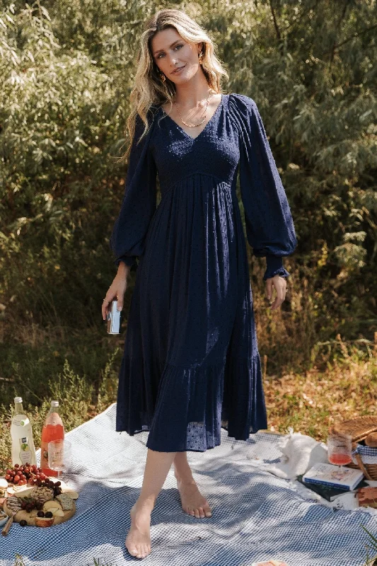 Wrap - style midi dresses in silk for a sophisticated office look Lainey Smocked Dotted Midi Dress | Midnight Blue Wrap - style midi dresses in silk for a sophisticated office look Lainey Smocked Dotted Midi Dress | Midnight Blue