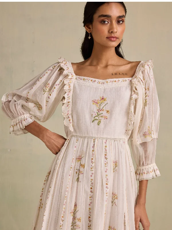 Midi dresses with tassel accents for a bohemian and free - spirited style Flower Loom Dress Midi dresses with tassel accents for a bohemian and free - spirited style Flower Loom Dress