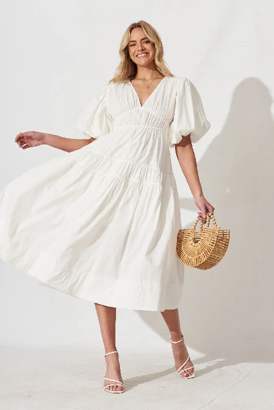 Midi dresses with ruffled bodices for a more pronounced feminine lookAmalie Midi Dress In White Cotton Midi dresses with ruffled bodices for a more pronounced feminine lookAmalie Midi Dress In White Cotton