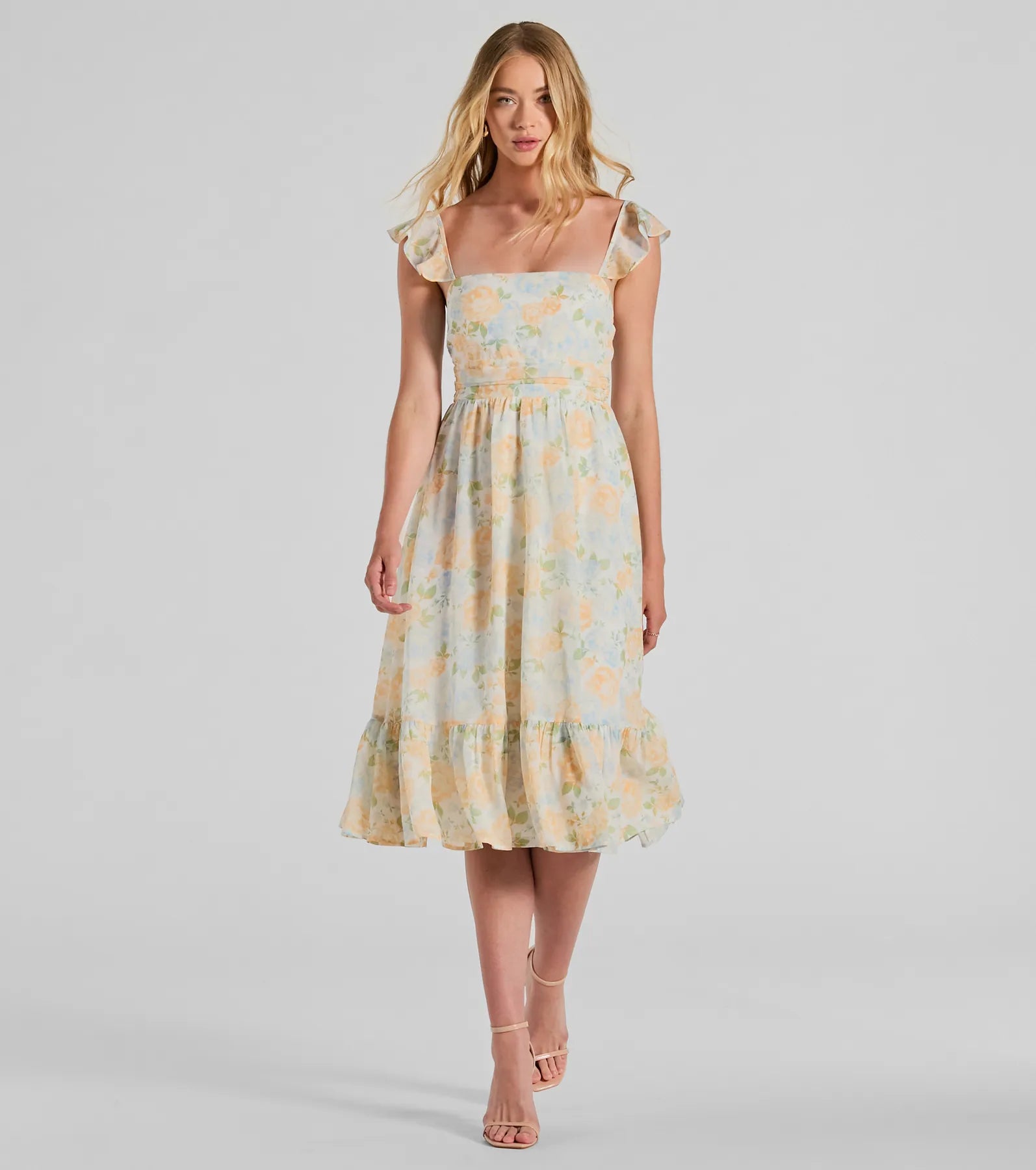 Midi dresses with geometric cutouts for a contemporary and edgy lookDelightfully Chic Ruffled Floral Chiffon Midi Dress Midi dresses with geometric cutouts for a contemporary and edgy lookDelightfully Chic Ruffled Floral Chiffon Midi Dress