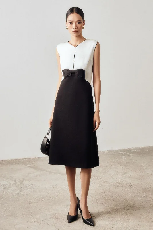 Midi dresses with ribbed textures for a unique and tactile appearanceDevi Straight V-Neck Poly Silk Midi Dress Midi dresses with ribbed textures for a unique and tactile appearanceDevi Straight V-Neck Poly Silk Midi Dress