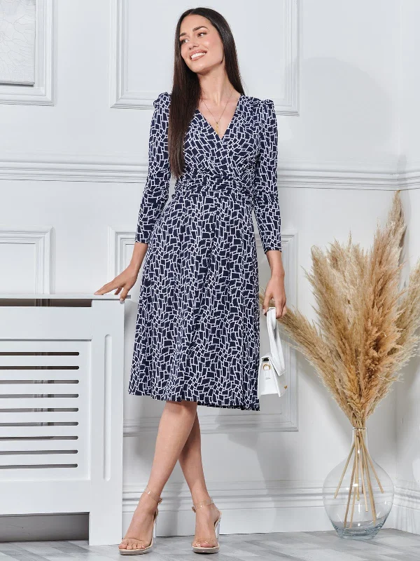 Midi dresses with ruched sleeves for a more fitted and stylish arm lookLong Sleeve Jersey Midi Dress, Navy Geo Midi dresses with ruched sleeves for a more fitted and stylish arm lookLong Sleeve Jersey Midi Dress, Navy Geo