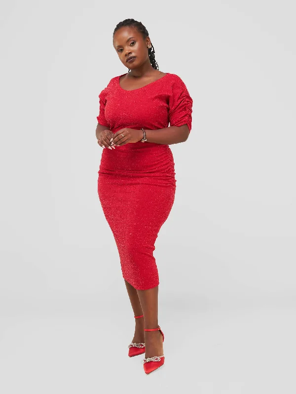 Midi dresses with geometric cutouts for a contemporary and edgy lookSalok Havilah Wear Sela Dress - Red Midi dresses with geometric cutouts for a contemporary and edgy lookSalok Havilah Wear Sela Dress - Red