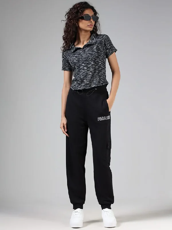 Women's recycled - material workout pants Wide - leg women jeans for a modern and relaxed vibe Studiofit Solid Black Printed Joggers Women's recycled - material workout pants Wide - leg women jeans for a modern and relaxed vibe Studiofit Solid Black Printed Joggers