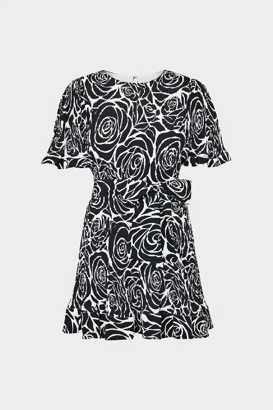 Mini dresses with tiered skirts for added volumeLumi Black Rose Pleated Dress