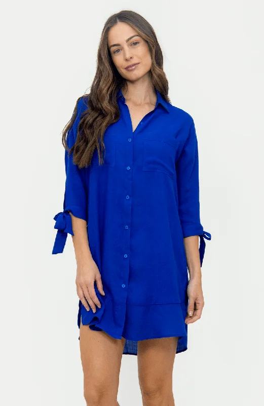 Striped cotton - blend cover ups for a classic and casual beachwearCamisa Azul Bailando Entre Palmas Striped cotton - blend cover ups for a classic and casual beachwearCamisa Azul Bailando Entre Palmas