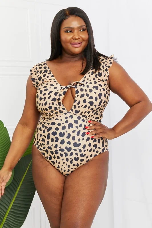 Women's Cut - Out One - Pieces in Black with Geometric Shapes for a Modern and Edgy StyleMarina West Swim Seashell Ruffle Sleeve One-Piece in Leopard Women's Cut - Out One - Pieces in Black with Geometric Shapes for a Modern and Edgy StyleMarina West Swim Seashell Ruffle Sleeve One-Piece in Leopard